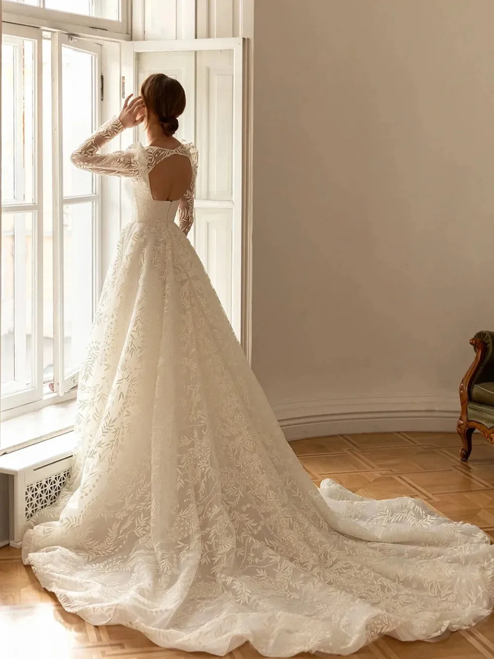 Here is an optimized title for the product:

Elegant Square Neck Wedding Dress with Luxury Lace and Detachable Sleeves

This title adds the modifier Elegant to emphasize the sophistication and refinement of the dress, while clearly conveying the key features of the product.